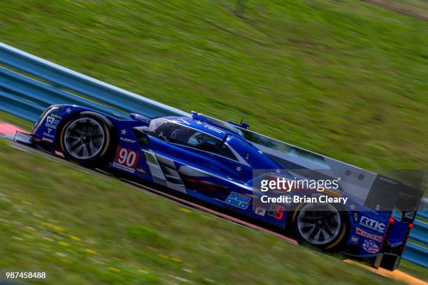 The Cadillac DPi of Matt McMurray and Tristan Vautier, of France, races on the track during practice for the Sahlens Six Hours of the Glen IMSA...