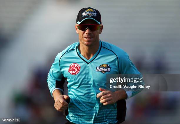 David Warner of Winnipeg Hawks runs to the boundary during a Global T20 Canada match against Montreal Tigers at Maple Leaf Cricket Club on June 29,...