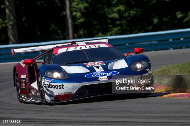 The Ford GT of Joey Hand and Dirk Mueller, of Germany, races on the track during practice for the Sahlens Six Hours of the Glen IMSA WeatherTech race...