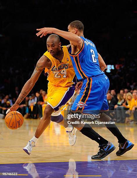 Kobe Bryant of the Los Angeles Lakers drives on Thabo Sefolosha of the Oklahoma City Thunder during Game Five of the Western Conference Quarterfinals...