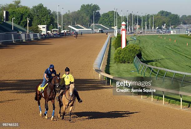 Kentucky Derby entrant American Lion with exercise rider James Graham up works out in advance of the 136th Running of the Kentucky Derby on April 29,...