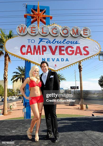 Model and television personality Holly Madison and entertainer Wayne Newton appear at the "Welcome to Fabulous Las Vegas" sign during the launch...