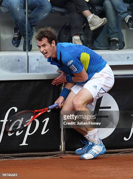 Andy Murray of Great Britain crashes into the side barrier in his match against David Ferrer of Spain during day five of the ATP Masters Series -...