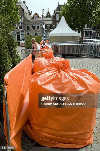 Orange sandbags line a street in Middelburg, the Netherlands, with announcements saying that there will be a preventative control in the area due to...