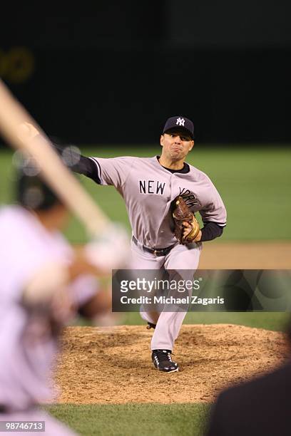 Javier Vazquez of the New York Yankees pitching during the game against the Oakland Athletics at the Oakland Coliseum on April 20, 2010 in Oakland,...