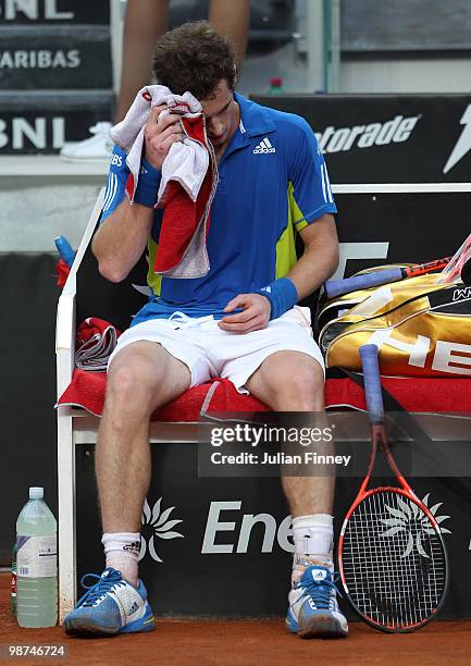 Andy Murray of Great Britain sits in his chair at the change of ends in his match against David Ferrer of Spain during day five of the ATP Masters...