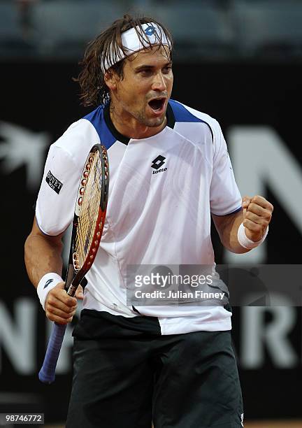 David Ferrer of Spain celebrates defeating Andy Murray of Great Britain during day five of the ATP Masters Series - Rome at the Foro Italico Tennis...