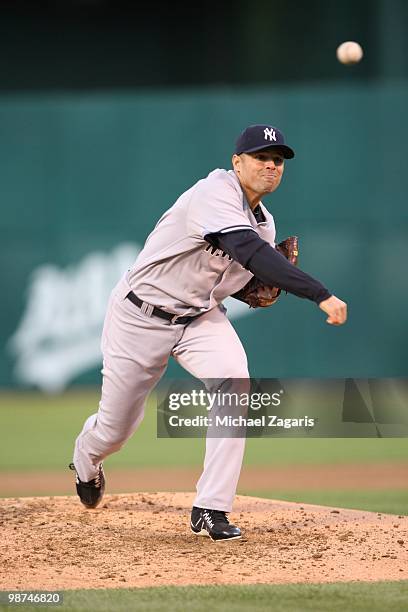 Javier Vazquez of the New York Yankees pitching during the game against the Oakland Athletics at the Oakland Coliseum on April 20, 2010 in Oakland,...