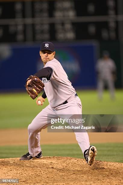 Javier Vazquez of the New York Yankees pitching during the game against the Oakland Athletics at the Oakland Coliseum on April 20, 2010 in Oakland,...