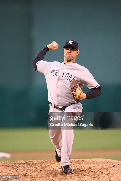 Javier Vazquez of the New York Yankees pitching during the game against the Oakland Athletics at the Oakland Coliseum on April 20, 2010 in Oakland,...