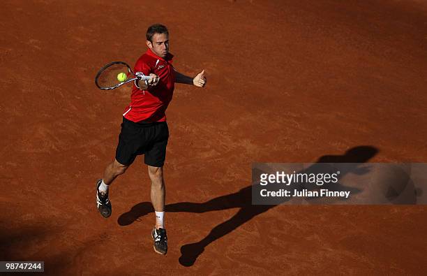 Filippo Volandri of Italy plays a forehand in his match against Ernests Gulbis of Latvia during day five of the ATP Masters Series - Rome at the Foro...