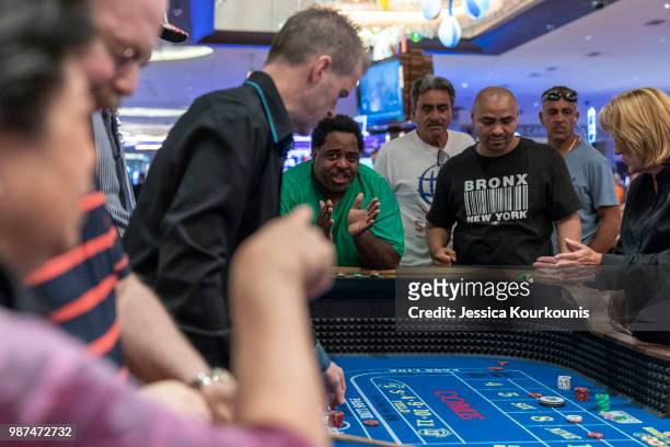 Patrons gamble inside the Hard Rock Hotel and Casino, previously the Trump Taj Mahal, on June 29, 2018 in Atlantic City, New Jersey. The Hard Rock is...
