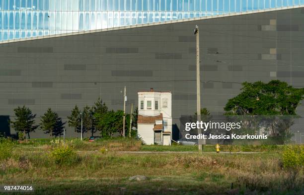 Lone house is dwarfed by an outside wall of the former Revel casino, reopened on this week as the Ocean Resort, on June 28, 2018 in Atlantic City,...