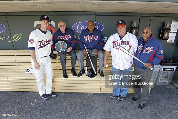 Joe Mauer of the Minnesota Twins poses with Harmon Killebrew, Tony Oliva, his father Jake Mauer, Rod Carew and the 2009 AL MVP award, 2009 Silver...