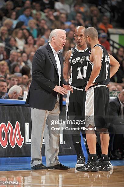 Head coach Gregg Popovich of the San Antonio Spurs talks with Tony Parker and Keith Bogans#10 against the Denver Nuggets on April 10, 2010 at the...