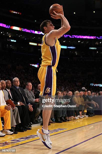 Luke Walton of the Los Angeles Lakers shoots a three-pointer while taking on the Oklahoma City Thunder during Game Five of the Western Conference...