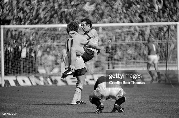 Arsenal's Liam Brady and Graham Rix celebrate at the end of a dramatic FA Cup Final against Manchester United at Wembley Stadium, 12th May 1979....