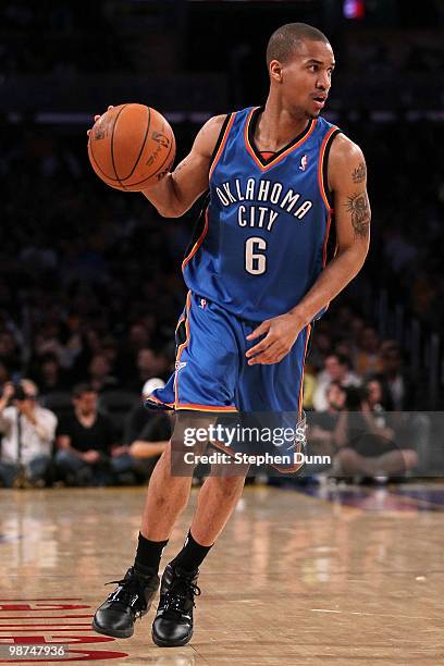 Eric Maynor of the Oklahoma City Thunder moves the ball while taking on the Los Angeles Lakers during Game Five of the Western Conference...