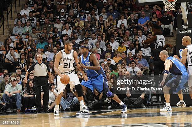 Tim Duncan of the San Antonio Spurs posts up against Brendan Haywood of the Dallas Mavericks in Game Three of the Western Conference Quarterfinals...