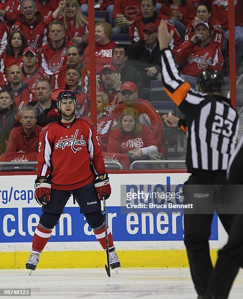 Mike Green of the Washington Capitals is called for a penalty against the Montreal Canadiens in Game Seven of the Eastern Conference Quarterfinals...