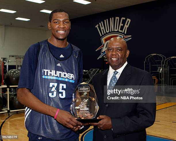 Kevin Durant of the Oklahoma City Thunder is presented the Kia Performance Award for NBA Player of the Month by Harrison J Jones ll at Thunder...