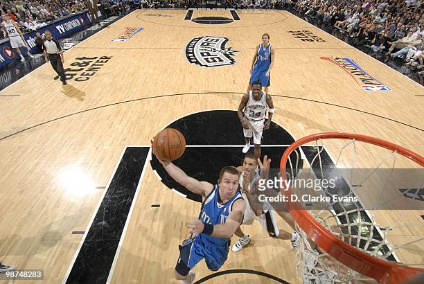 Jose Barea of the Dallas Mavericks jumps to the basket for the layup against the San Antonio Spurs in Game Three of the Western Conference...
