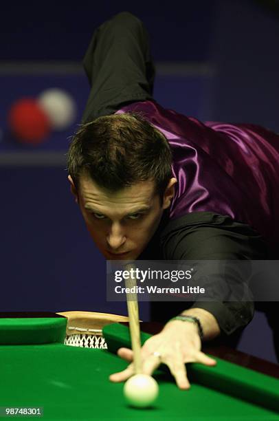 Mark Selby of England in action against Graeme Dott of Scotland during the semi final match of the Betfred.com World Snooker Championships at The...