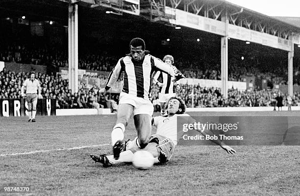 West Bromwich Albion striker Cyrille Regis is tackled by Newcastle United defender Alan Kennedy during their First Division match at the Hawthorns in...