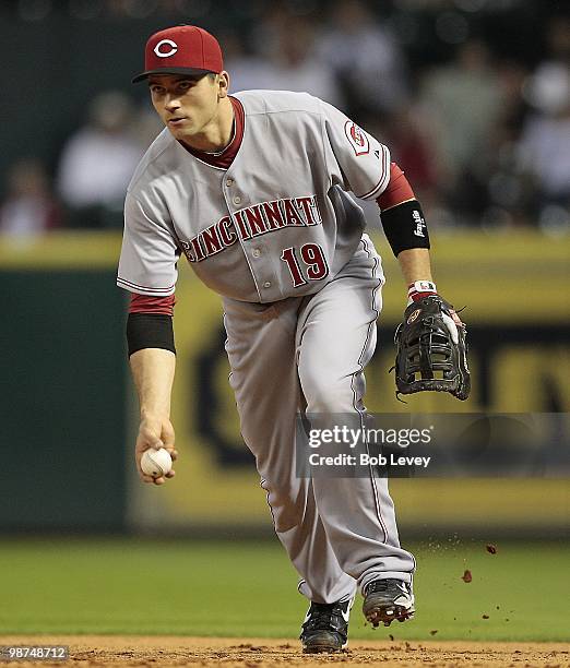 First baseman Joey Votto of the Cincinnati Reds tosses the ball to first base against the Houston Astros at minute Maid Park on April 28, 2010 in...