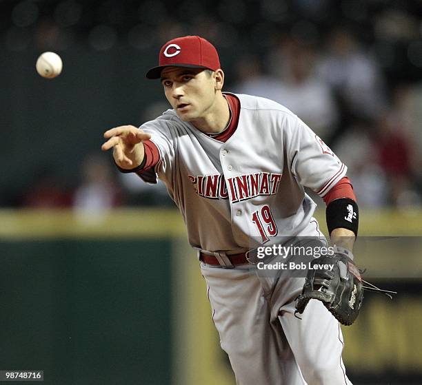 First baseman Joey Votto of the Cincinnati Reds tosses the ball to first base against the Houston Astros at minute Maid Park on April 28, 2010 in...