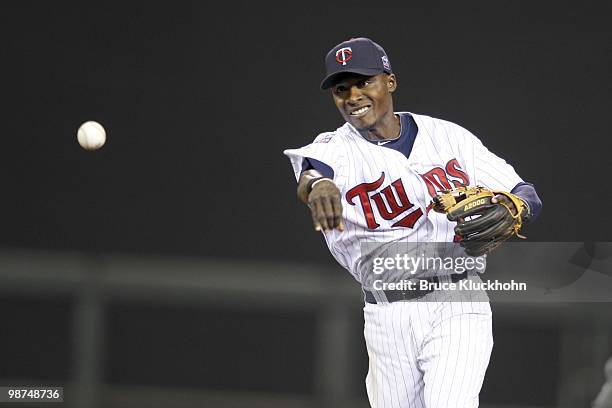 Orlando Hudson of the Minnesota Twins throws to first base against the Cleveland Indians on April 20, 2010 at Target Field in Minneapolis, Minnesota....