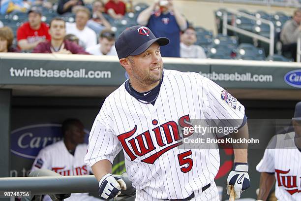 Michael Cuddyer of the Minnesota Twins smiles before the game with the Cleveland Indians on April 20, 2010 at Target Field in Minneapolis, Minnesota....