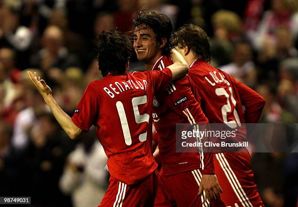 Alberto Aquilani of Liverpool celebrates scoring the opening goal with team mate Yossi Benayoun during the UEFA Europa League Semi-Final Second Leg...