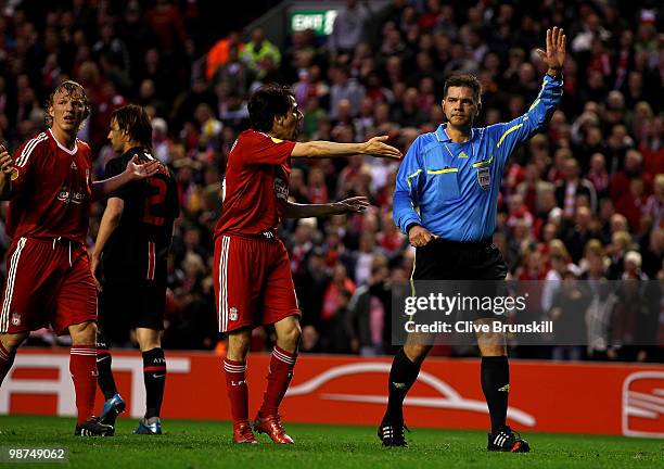 Yossi Benayoun protests to Referee Terje Hauge after he disallowed a goal by Daniel Agger of Liverpool during the UEFA Europa League Semi-Final...