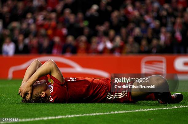 Dirk Kuyt of Liverpool reacts to a missed chance during the UEFA Europa League Semi-Final Second Leg match between Liverpool and Atletico Madrid at...