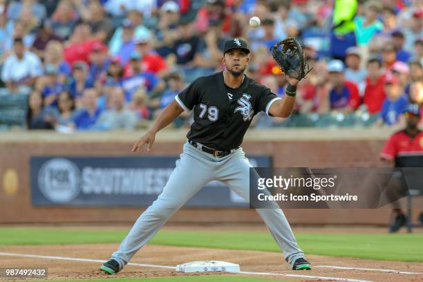 Chicago White Sox First base Jose Abreu catches a ball during the game between the Chicago White Sox and Texas Rangers on June 29, 2018 at Globe Life...