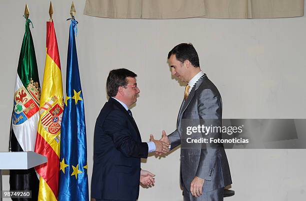 Regional President Guillermo Fernandez Vara delivers the 'Medalla de Extremadura' to Prince Felipe of Spain, at the Parador Nacional on April 29,...