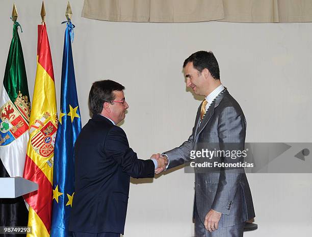 Regional President Guillermo Fernandez Vara delivers the 'Medalla de Extremadura' to Prince Felipe of Spain, at the Parador Nacional on April 29,...