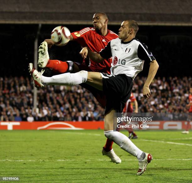 Bobby Zamora of Fulham battles with Jerome Boateng of Hamburg during the UEFA Europa League Semi-Final 2nd leg match between Fulham and Hamburger SV...