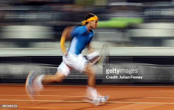 Rafael Nadal of Spain runs for a drop shot in his match against Victor Hanescu of Romania during day five of the ATP Masters Series - Rome at the...