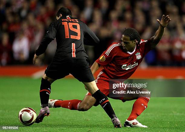Glen Johnson of Liverpool challenges Jose Antonio Reyes of Atletico Madrid during the UEFA Europa League Semi-Final Second Leg match between...