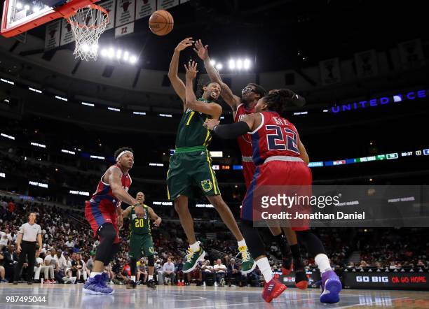Jermaine Taylor of Ball Hogs passes against Amar'e Stoudemire of Tri State during week two of the BIG3 three on three basketball league at United...