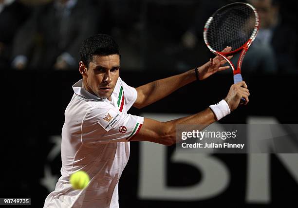 Victor Hanescu of Romania plays a backhand in his match against Rafael Nadal of Spain during day five of the ATP Masters Series - Rome at the Foro...