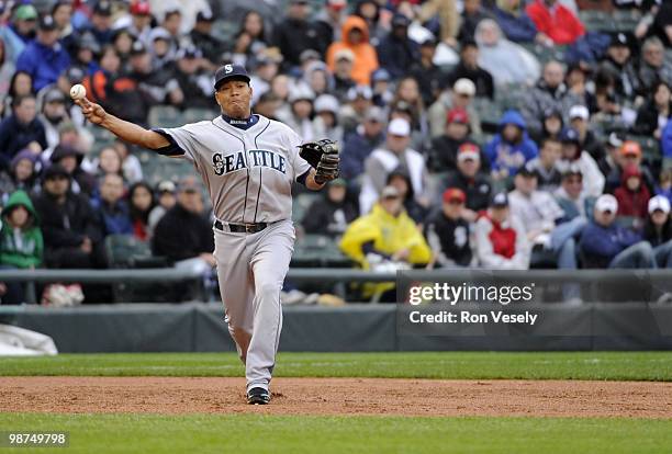 Jose Lopez of the Seattle Mariners throws the ball to first base against the Chicago White Sox on Sunday, April 25 at U.S. Cellular Field in Chicago,...