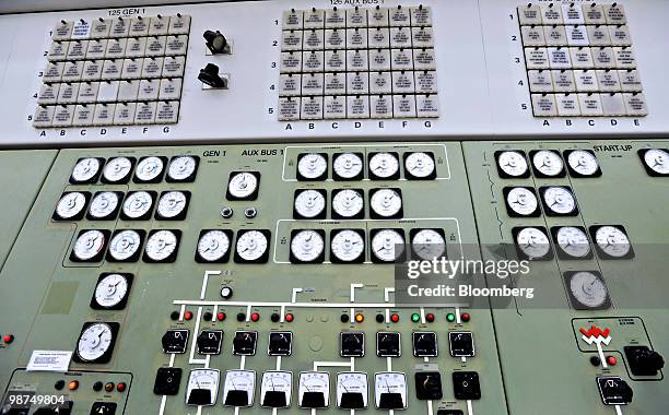 Gauges monitor the status of turbines generating electricity in the control room at Exelon Corp.'s Limerick nuclear power generating station in...