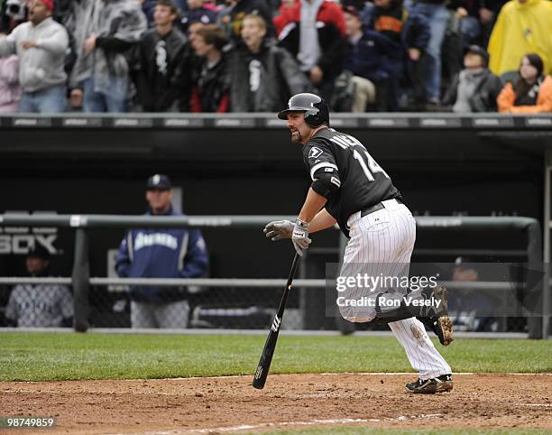 Paul Konerko of the Chicago White Sox hits a home run in the eighth inning off of Brandon League of the Seattle Mariners on Sunday, April 25 at U.S....