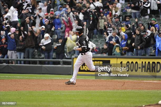 Paul Konerko of the Chicago White Sox hits a home run in the eighth inning off of Brandon League of the Seattle Mariners on Sunday, April 25 at U.S....