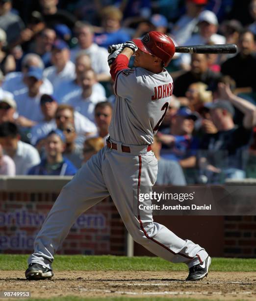 Kelly Johnson of the Arizona Diamondbacks hits a three-run home run during a seven run 7th inning against the Chicago Cubs at Wrigley Field on April...