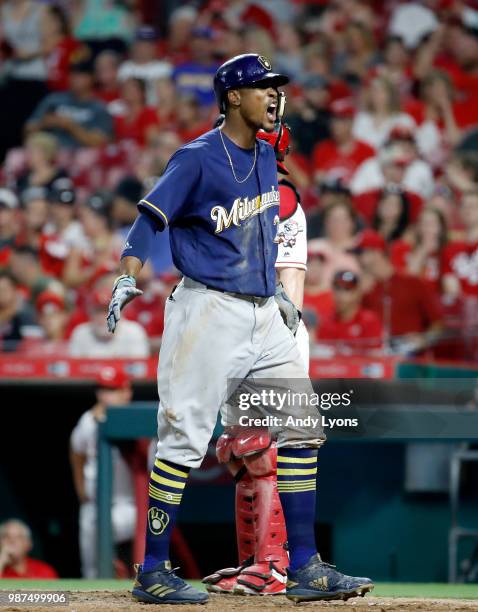 Keon Broxton of the Milwaukee Brewers celebrates after hitting a home run in the ninth inning against the Cincinnati Reds at Great American Ball Park...