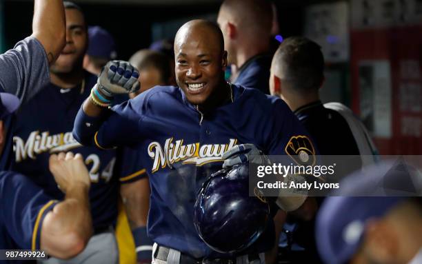 Keon Broxton of the Milwaukee Brewers celebrates with teammates after hitting a home run in the ninth inning against the Cincinnati Reds at Great...